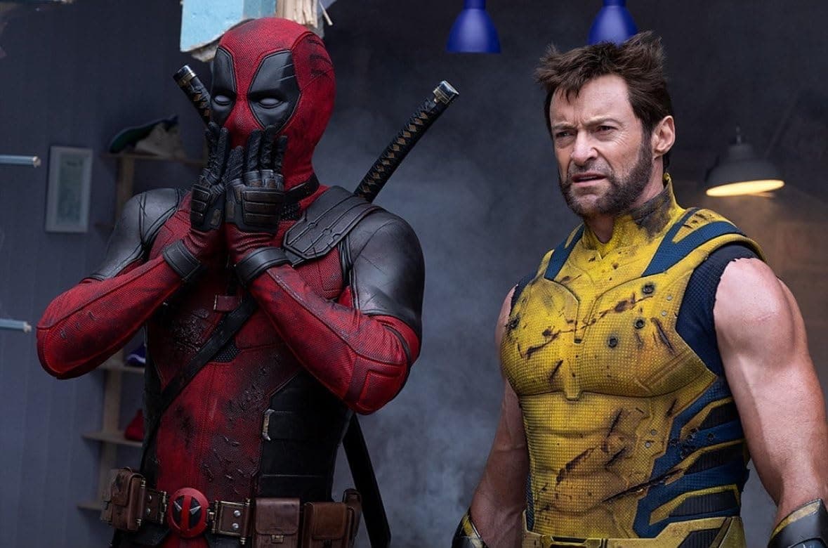 Deadpool and Wolverine facing off